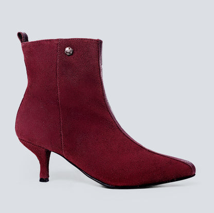 Botines en cuero lineal vino