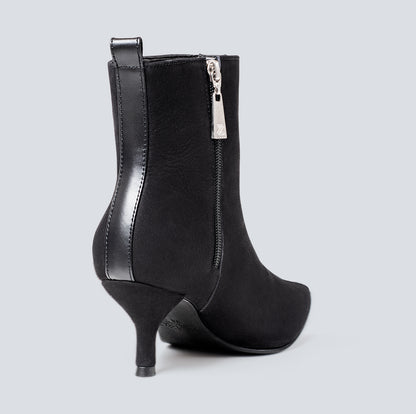 Botines en cuero lineal negro