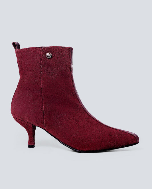 Botines en cuero lineal vino