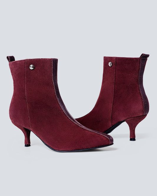 Botines en cuero lineal vino